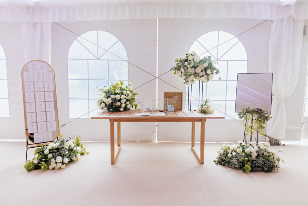 White Floral Centerpieces on Gift Table