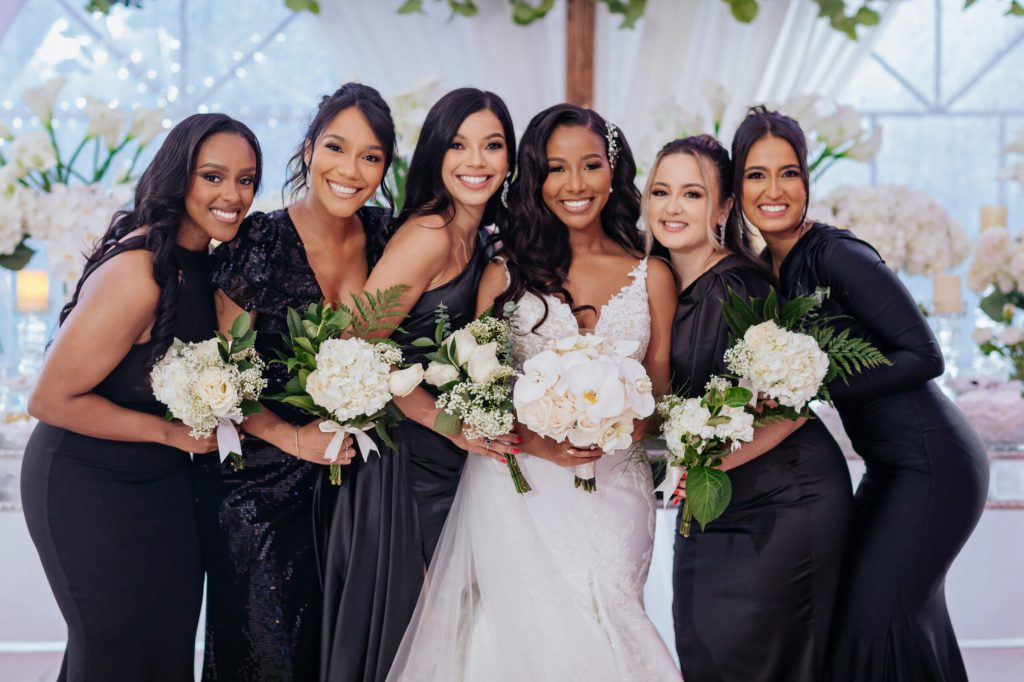 Bride and Bridesmaids Classy and Timeless White Florals and Black Dresses