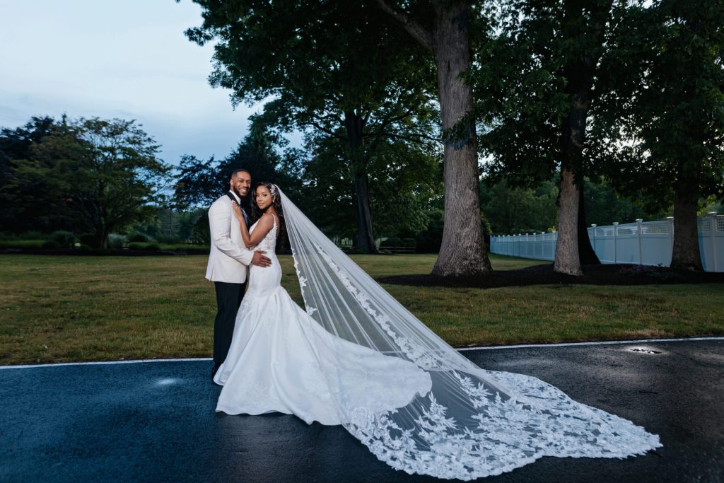 Bride and Groom portrait Outside Cathedral Veil