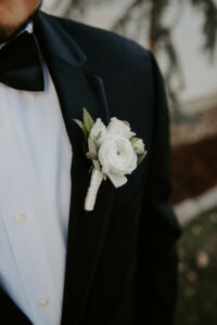 White Rose Boutonniere Close Up 