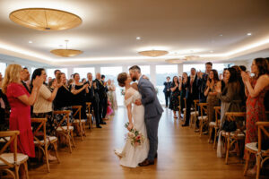 bride and groom at indoor ceremony 
