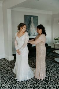 Mother and Bride Getting Ready Winter Wedding Sleeved Gown 