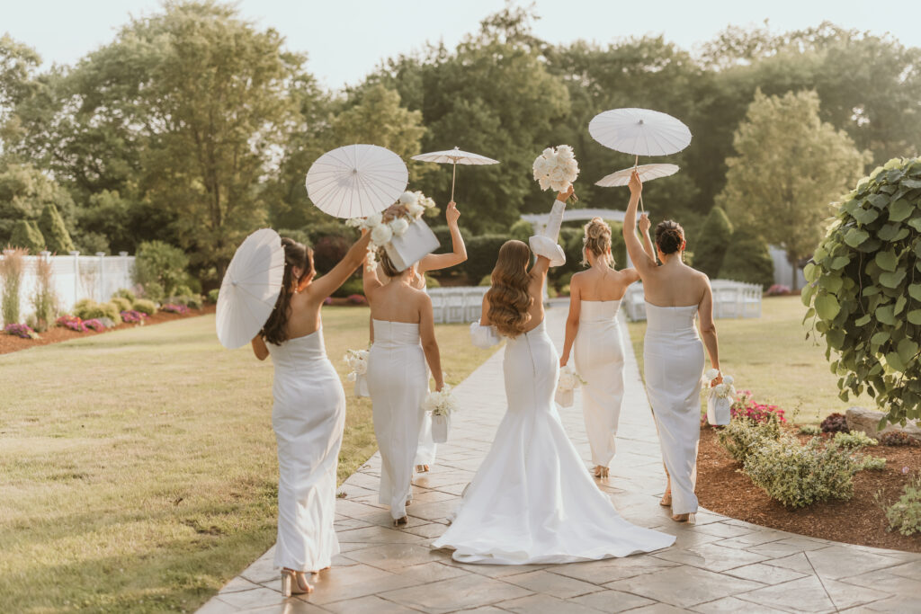 Bride and Bridesmaids With parasols
