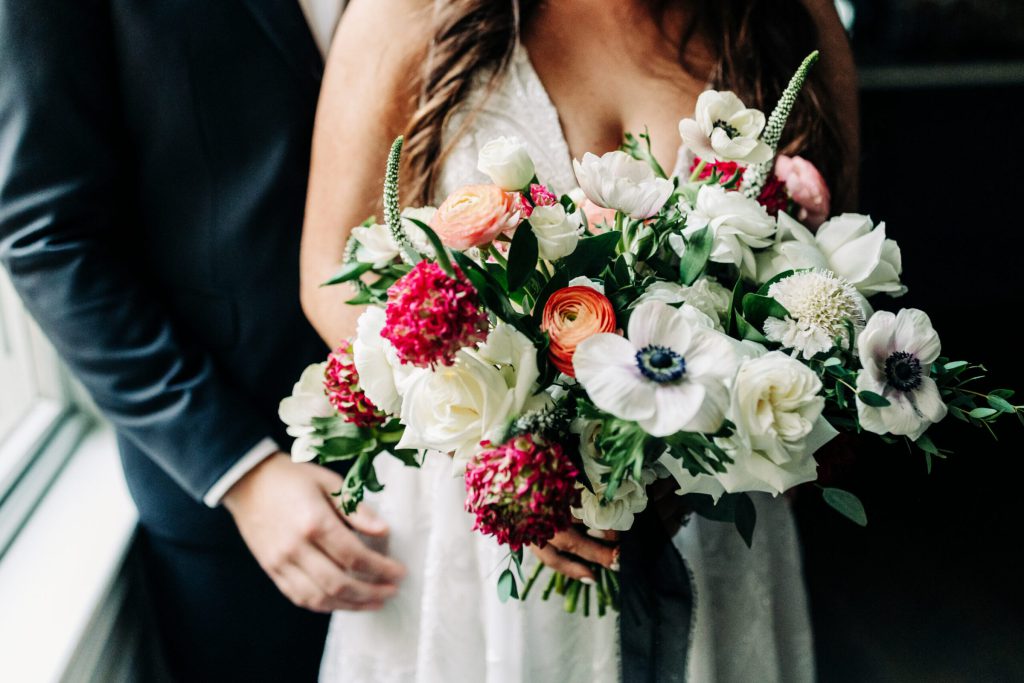 Close Up Bridal Bouquet Fall Colors Red Orange and White Flowers