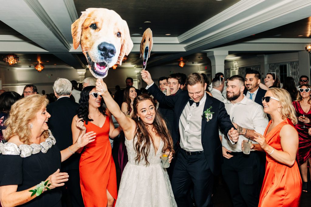 Bride and Groom With Guests at Wedding Reception