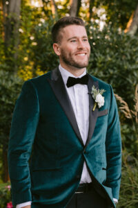 Groom Wearing Dark Green Color Wedding Suit