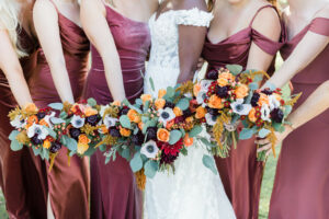 Bride and Bridesmaids Orange Colors Bouquets