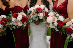 Bride and Bridesmaids with Red Bouquets