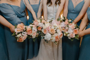 Bride and Bridesmaids Holding Pink Bouquets