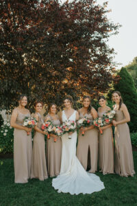 Bride and Bridesmaids Outside At The Villa Neutral Wedding COlor Palette