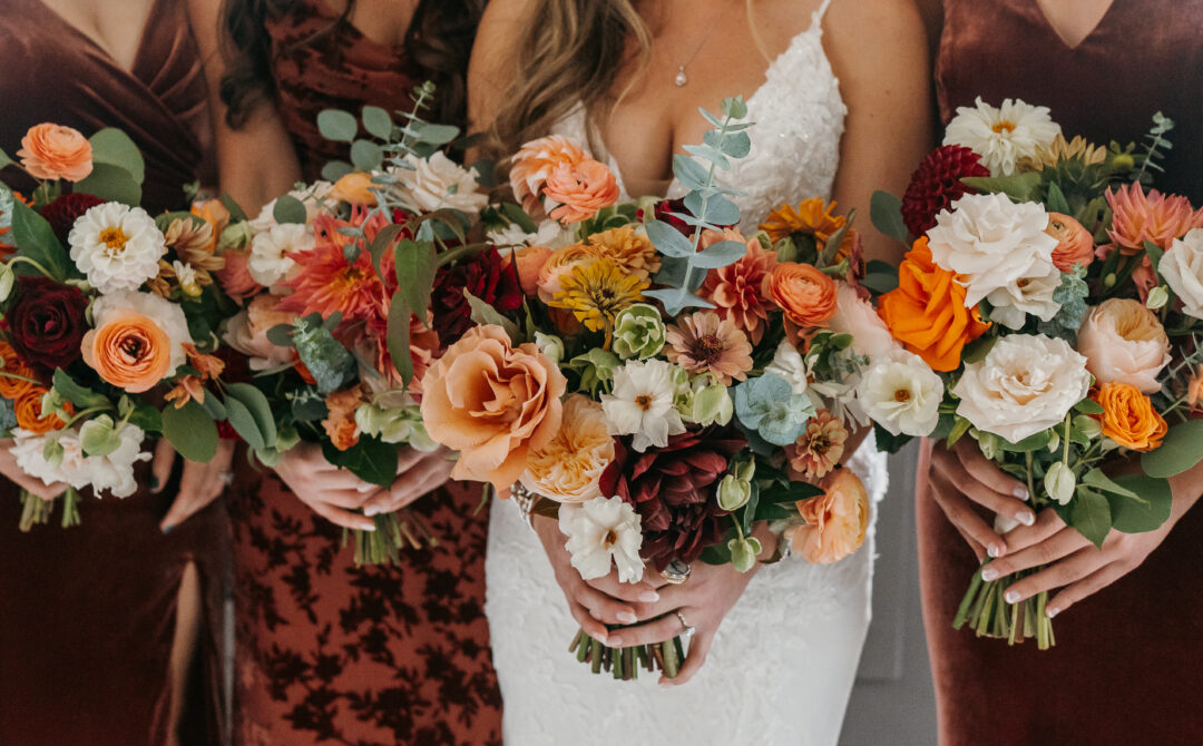 Bride and Bridesmaids Holding Bouquets Fall Color Palette