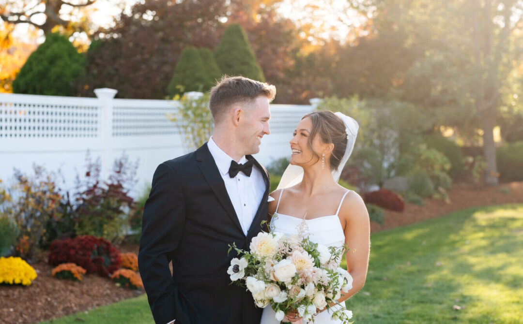 bride and groom at their fall tent wedding
