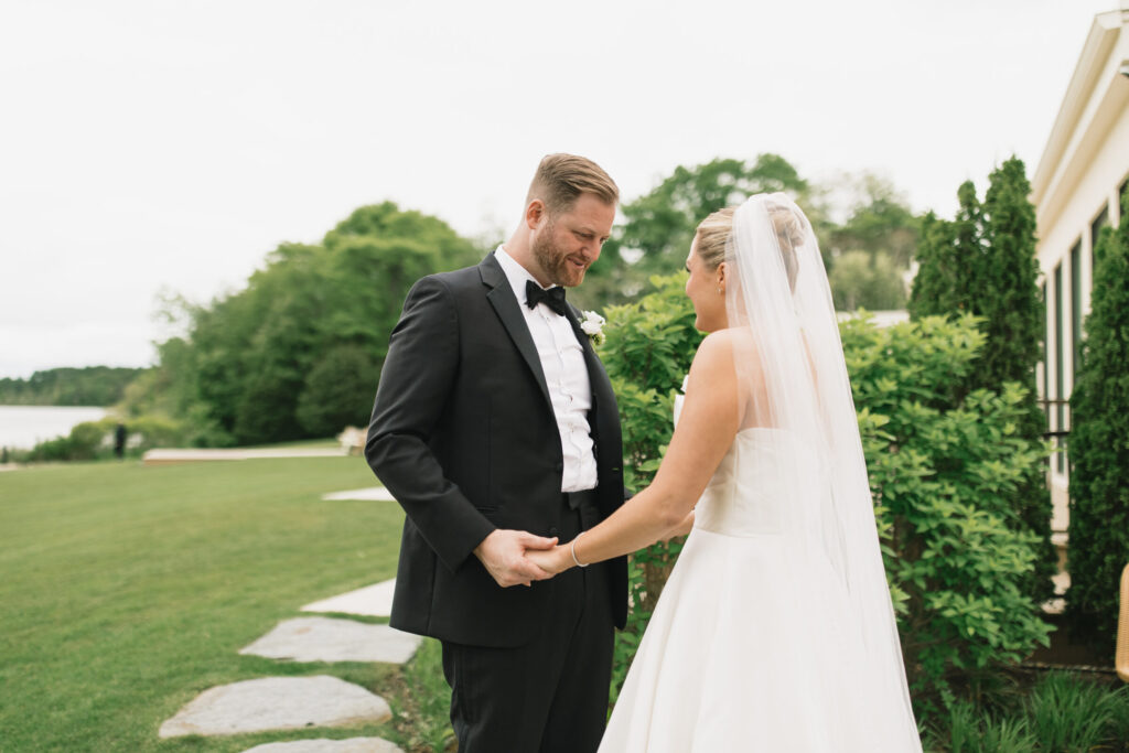 Bride and groom's lakeside first look