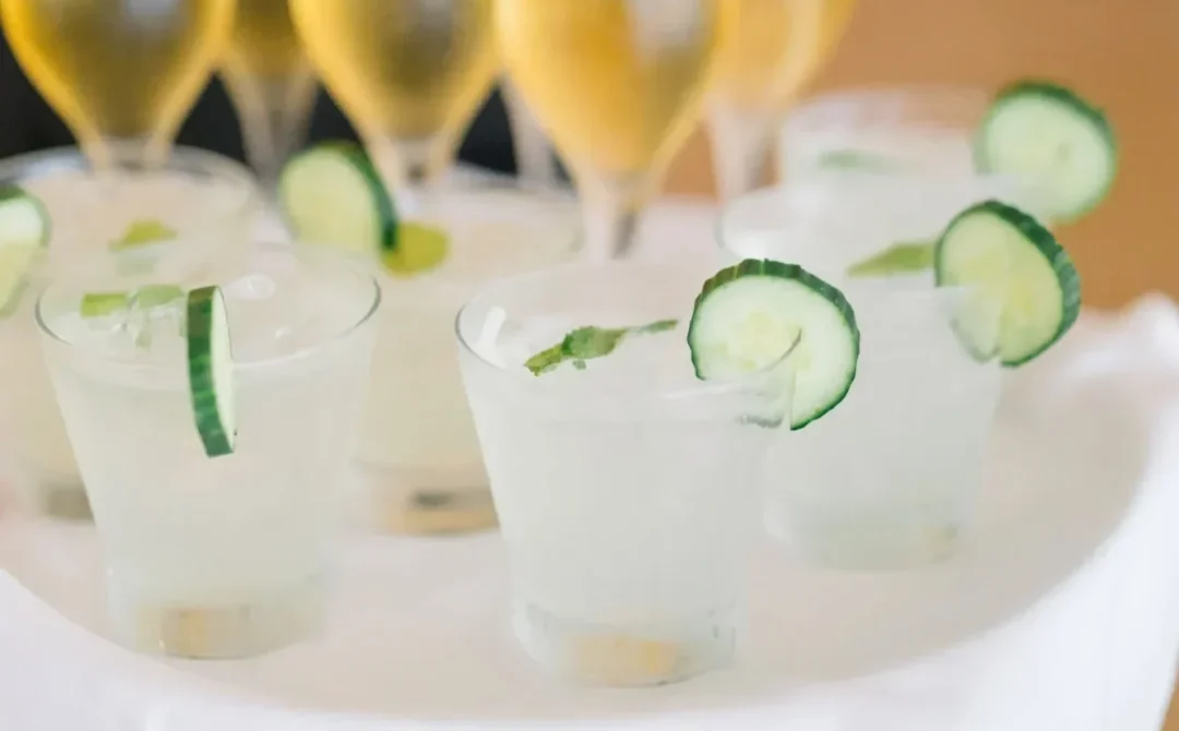 Saphire Event Group | Server holding a drinks tray with champagne and cocktails